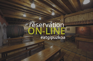 Réserver une table pour dîner à la cidrerie Aburuza, menu traditionnel de cidrerie et autres menus de la cuisine basque